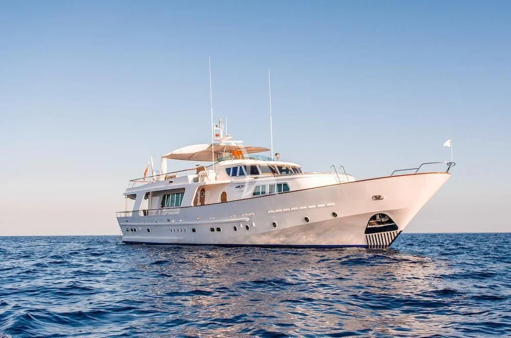 a white boat in the water aboard A&A Yacht for Charter