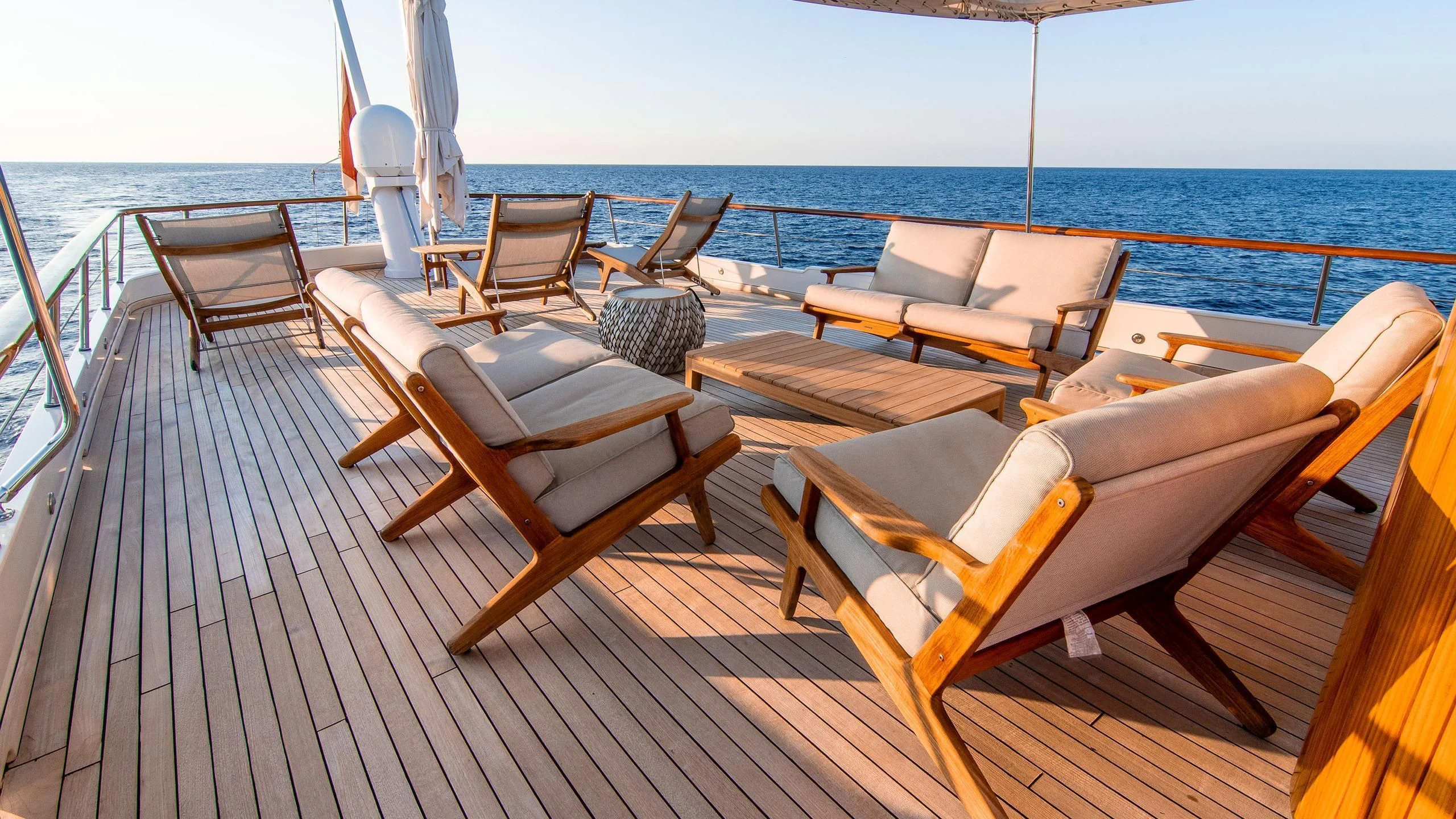 a deck with chairs on it aboard A&A Yacht for Charter