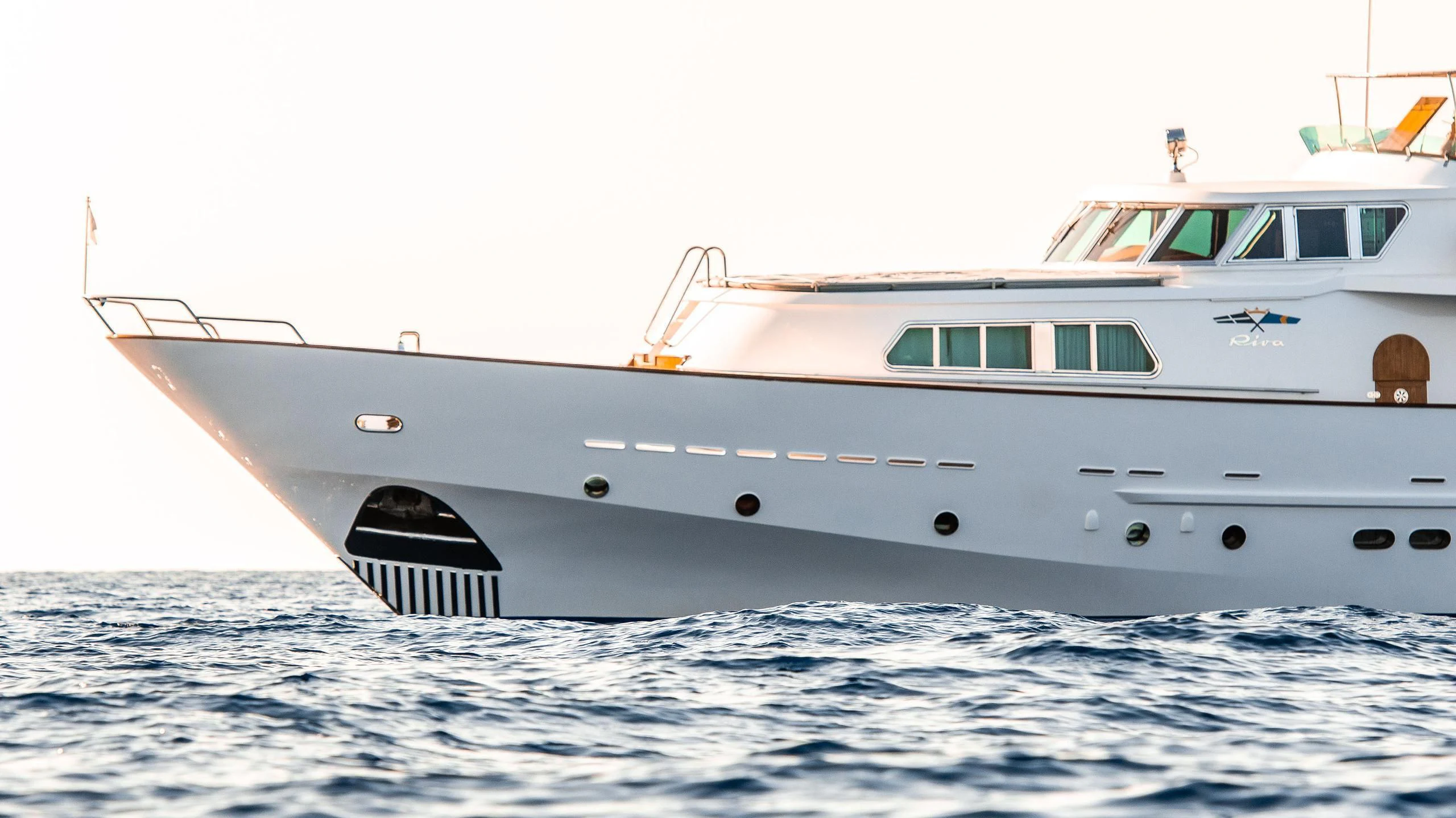 a white yacht on the water aboard A&A Yacht for Charter