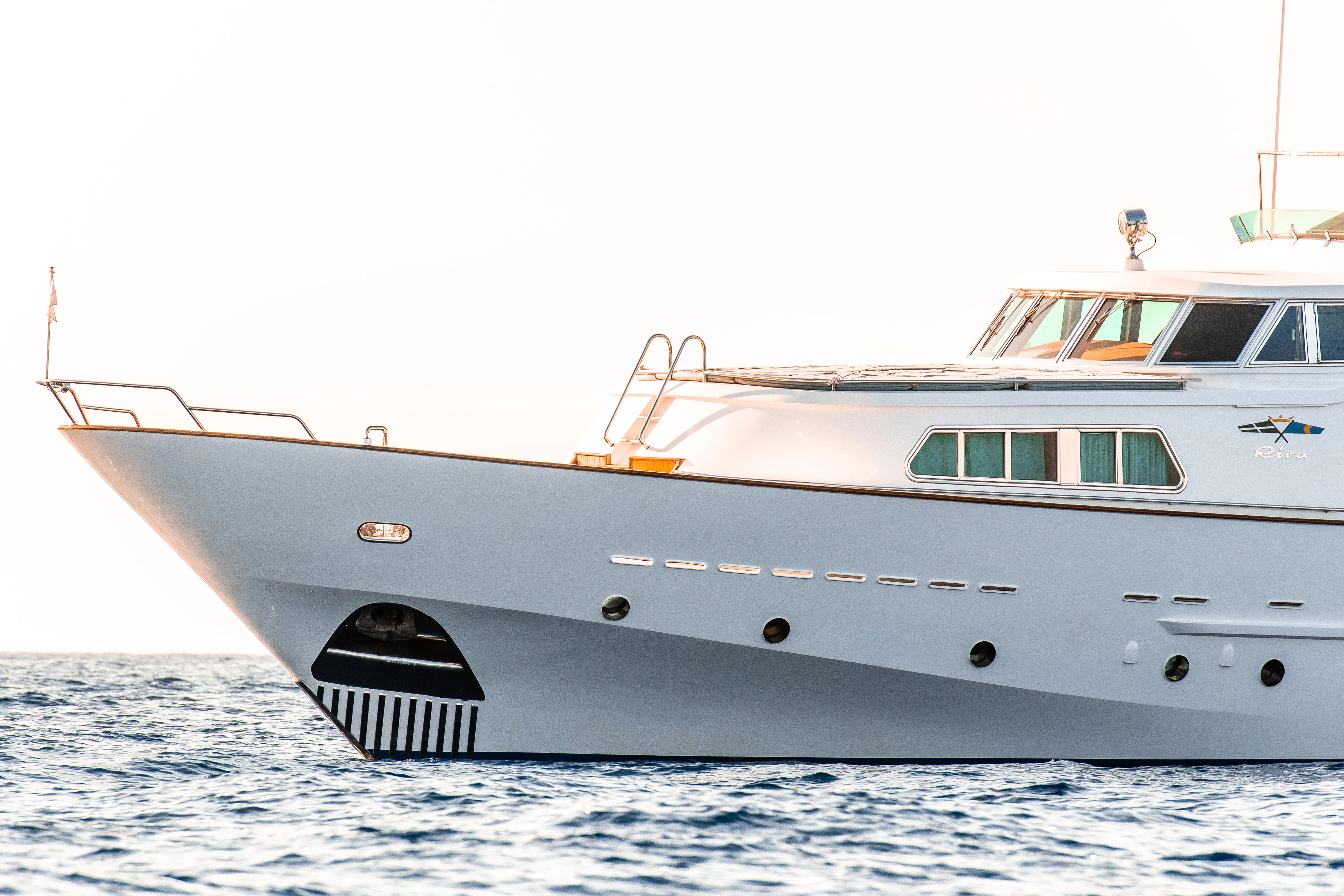 a white yacht on the water aboard A&A Yacht for Charter