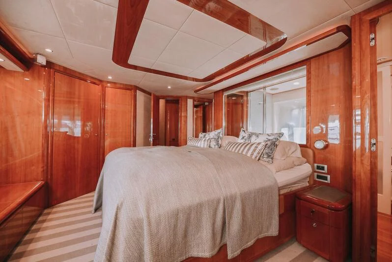 a room with a bed and a wood door aboard SEA YOU Yacht for Sale