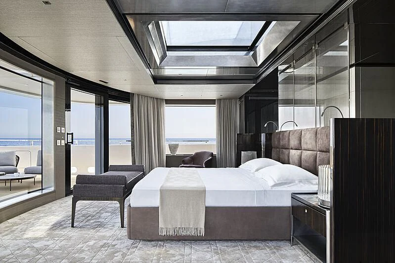 a room with a bed and a table aboard LEMON TREE Yacht for Charter