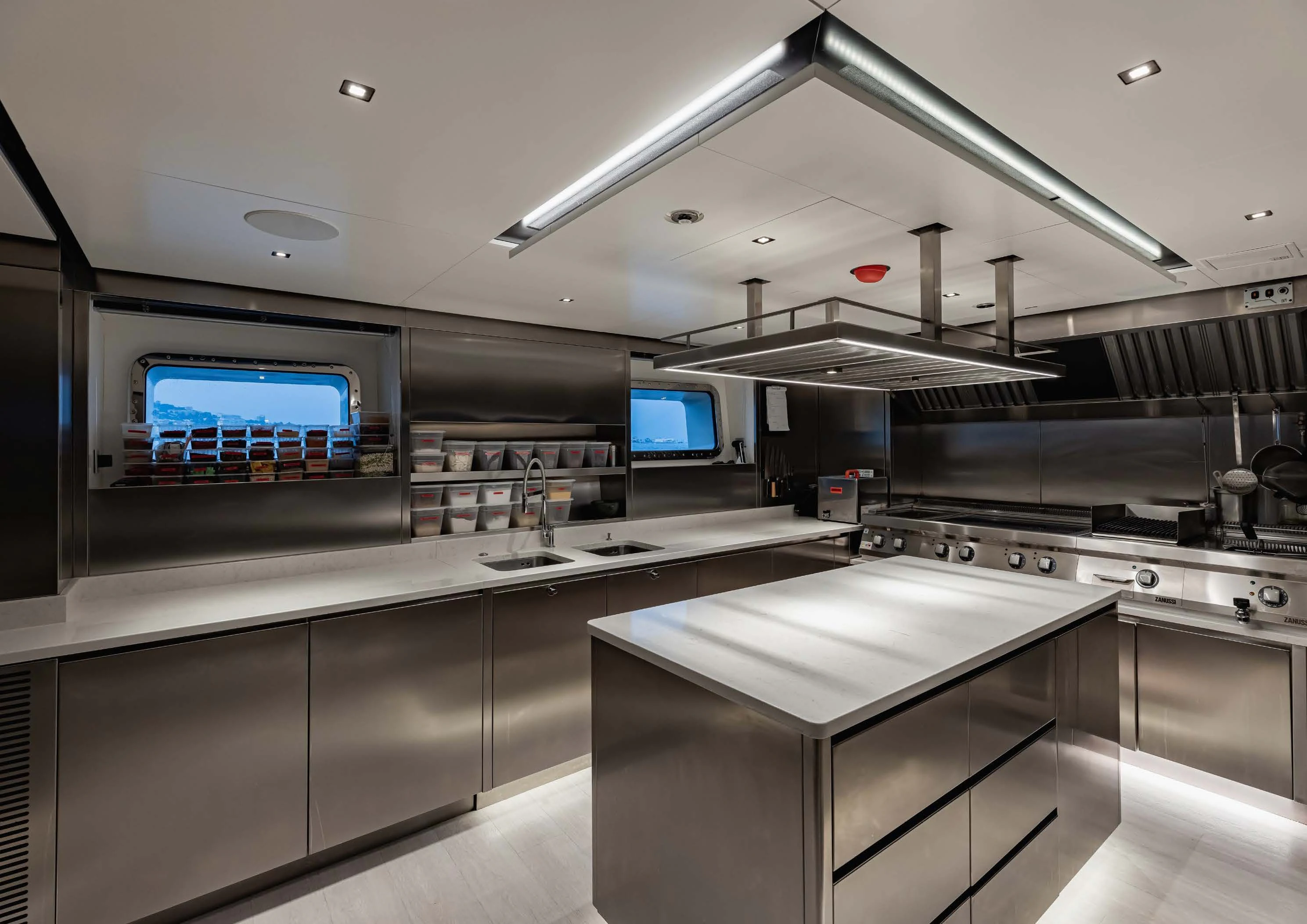 a kitchen with a large counter aboard LEMON TREE Yacht for Charter