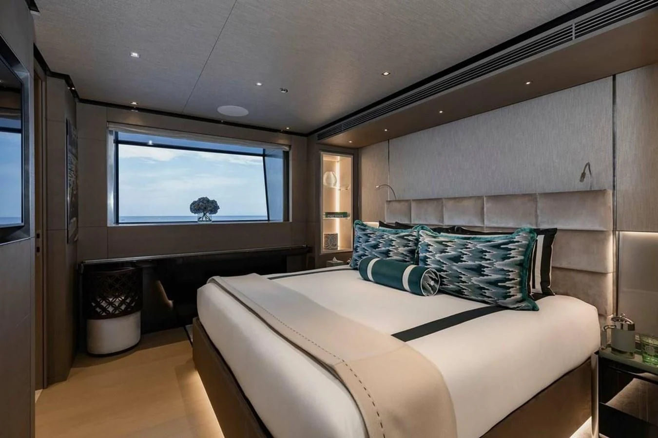 a bedroom with a large bed aboard LEMON TREE Yacht for Charter