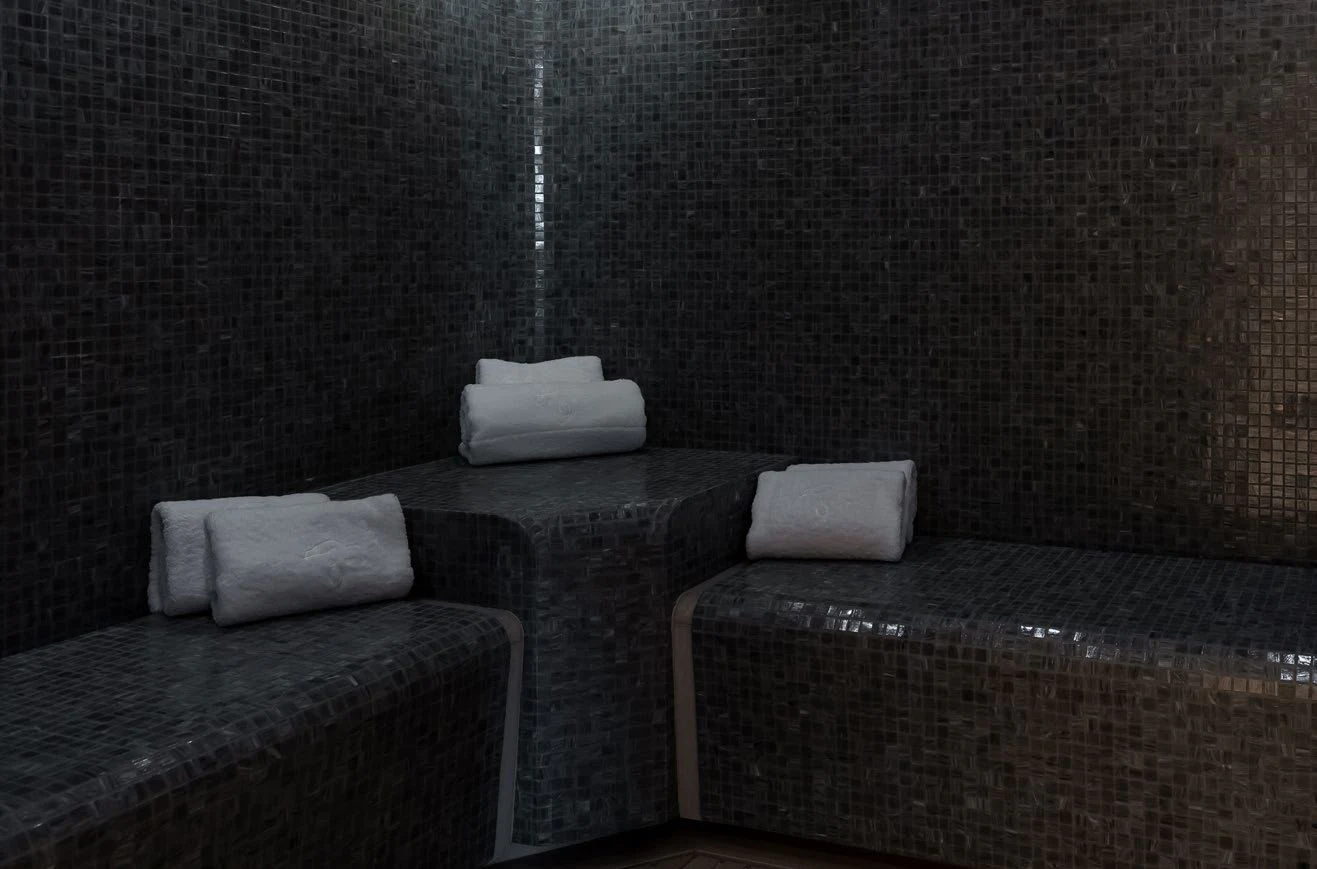 a bed with a pillow on it aboard LEMON TREE Yacht for Charter