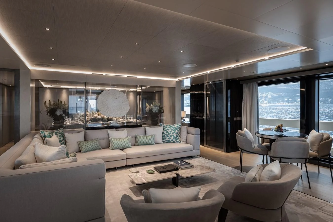 a living room with a large window aboard LEMON TREE Yacht for Charter