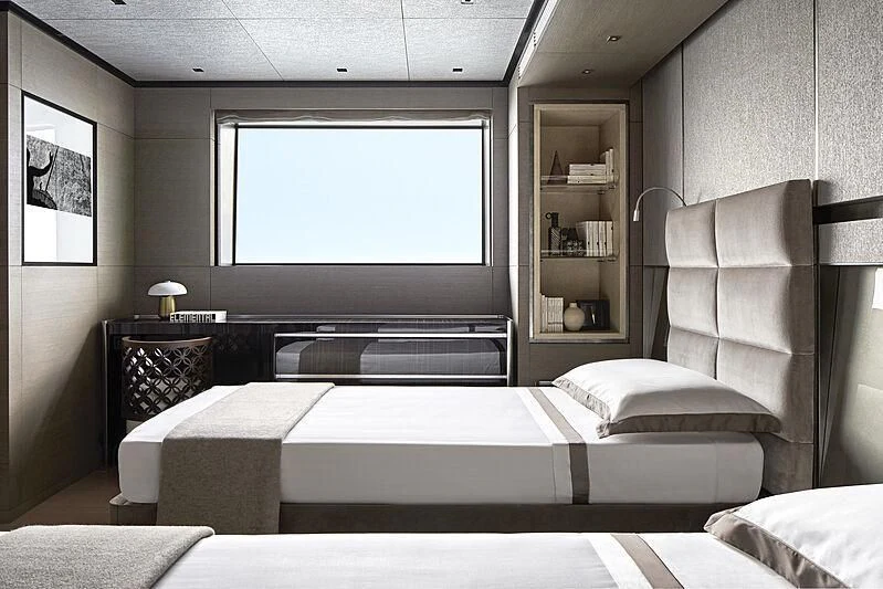 a bedroom with a large bed aboard LEMON TREE Yacht for Charter