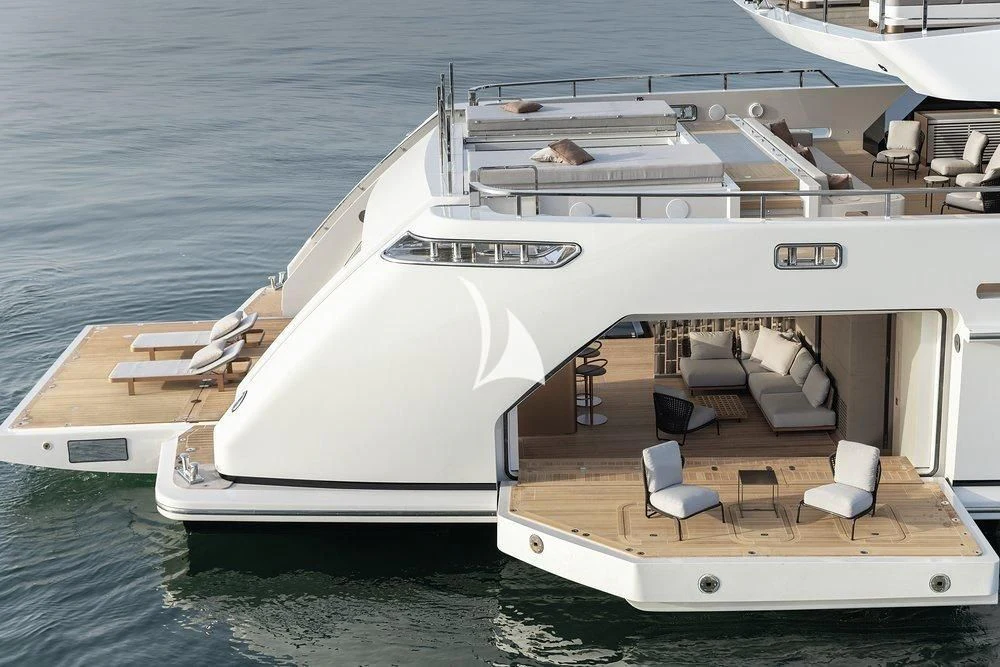 a large white yacht on the water aboard LEMON TREE Yacht for Charter