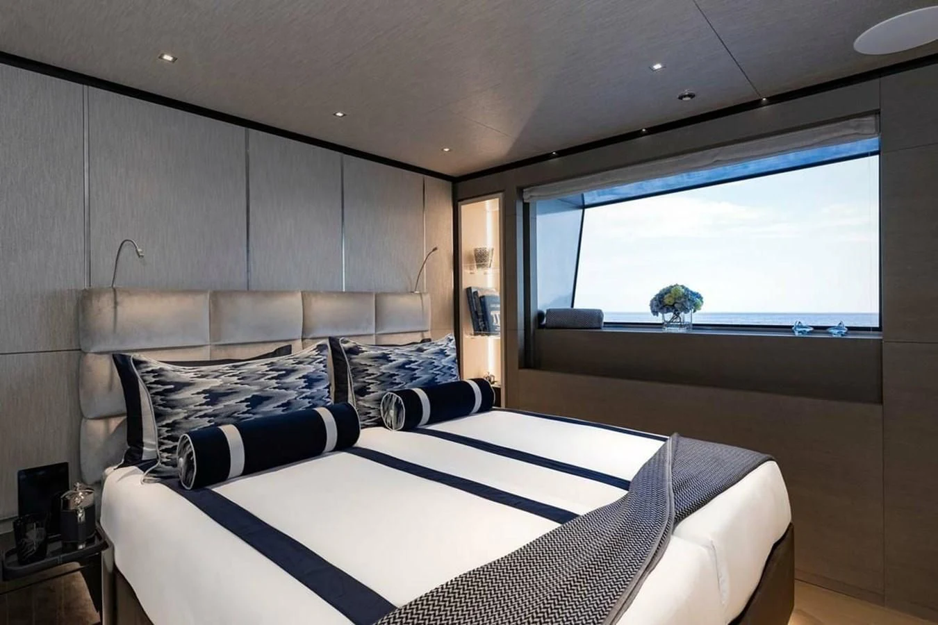 a bedroom with a large bed aboard LEMON TREE Yacht for Charter