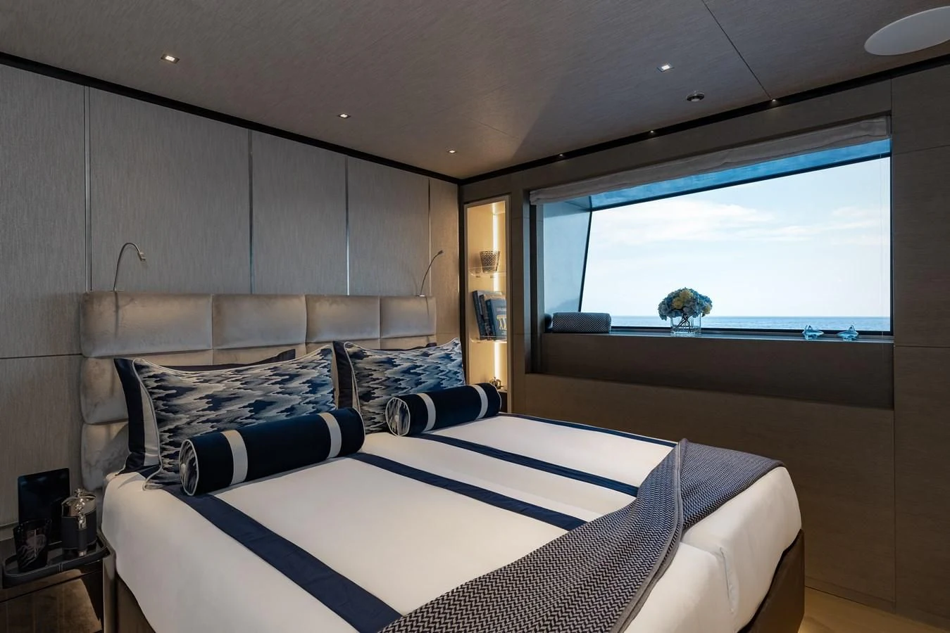 a bedroom with a large bed aboard LEMON TREE Yacht for Charter