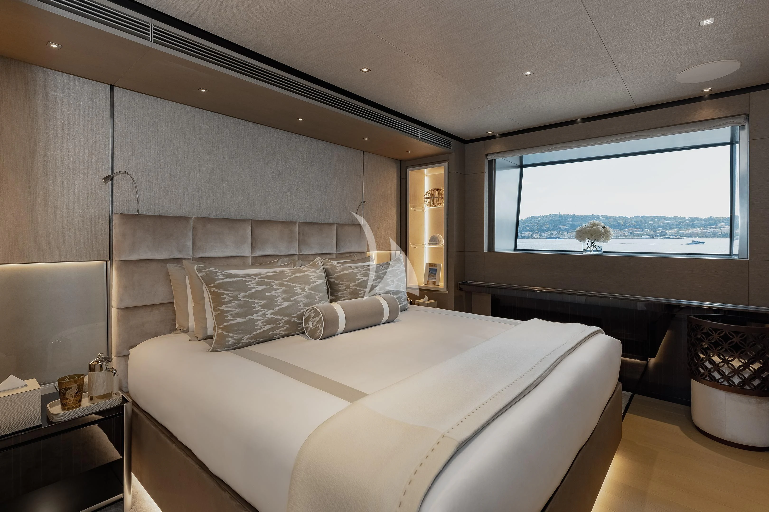 a room with a bed and a window aboard LEMON TREE Yacht for Charter