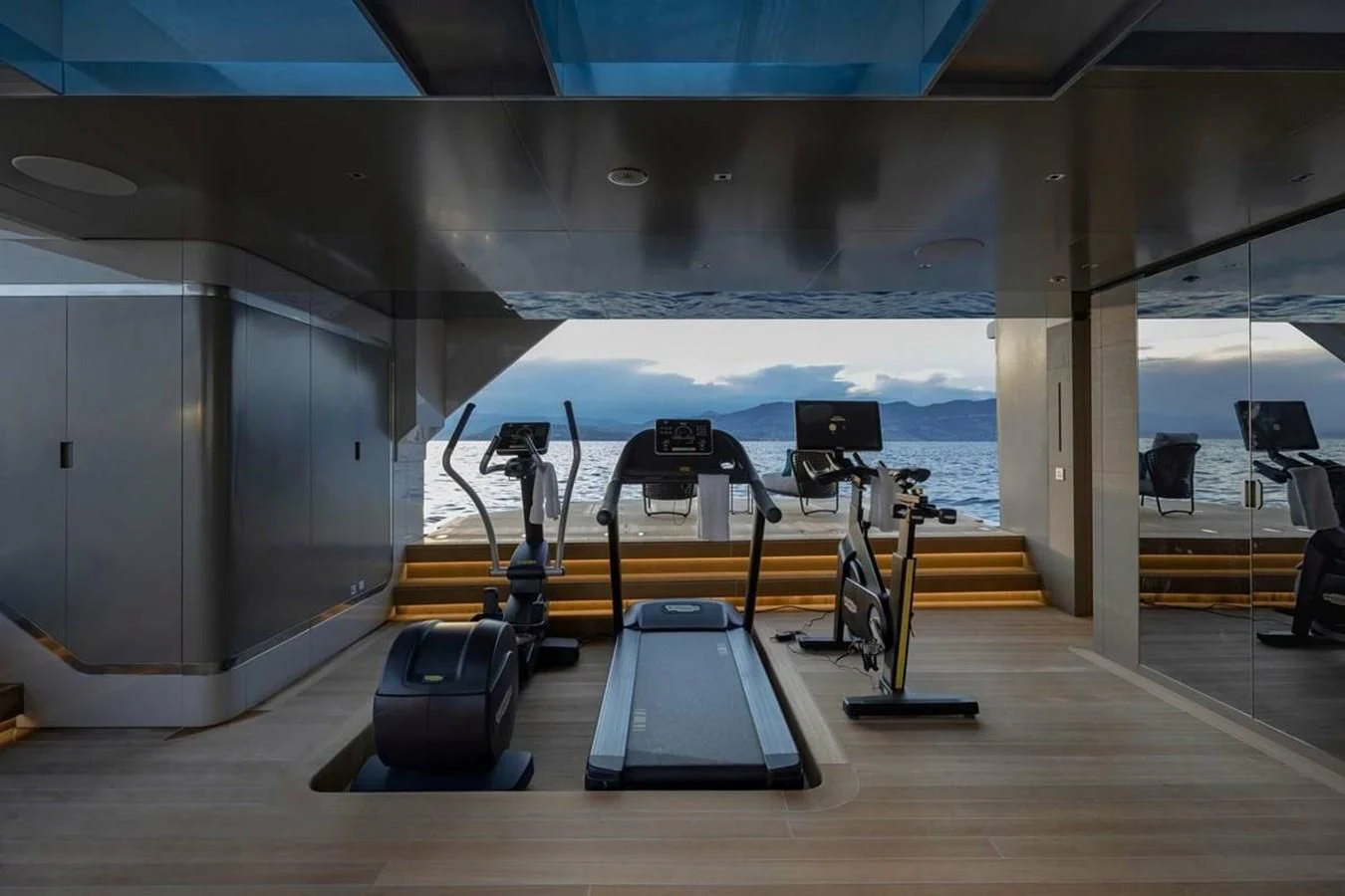 a gym with exercise equipment aboard LEMON TREE Yacht for Charter