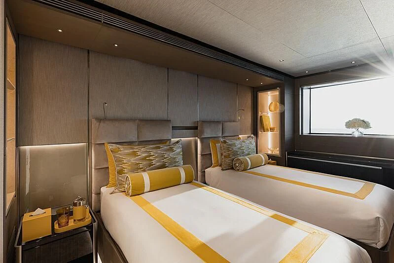 a room with a couple of beds aboard LEMON TREE Yacht for Charter