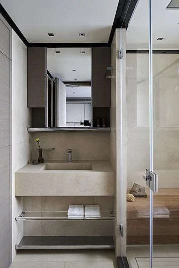 a bathroom with a glass shower aboard LEMON TREE Yacht for Charter