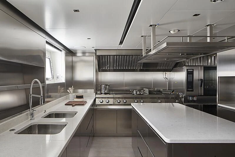 a kitchen with stainless steel appliances aboard LEMON TREE Yacht for Charter