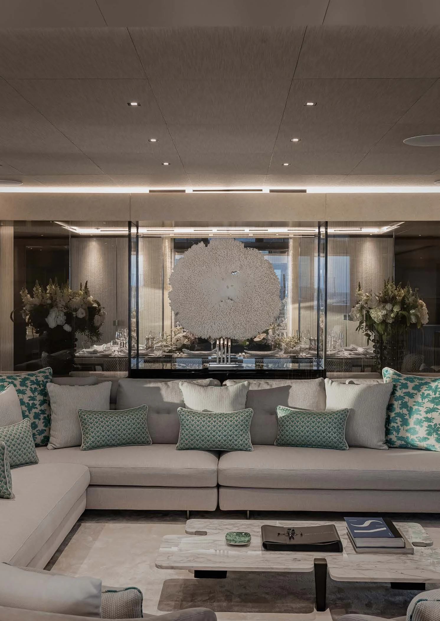 a living room with a large window aboard LEMON TREE Yacht for Charter