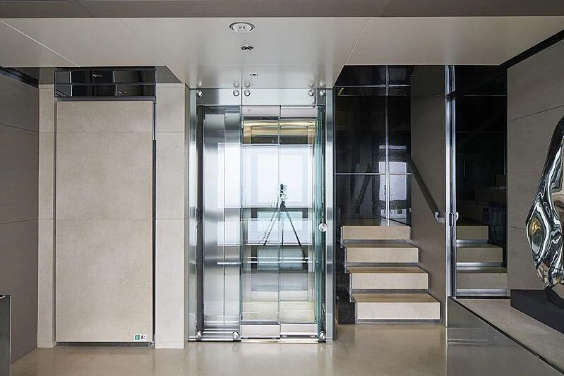 a large glass door in a room aboard LEMON TREE Yacht for Charter
