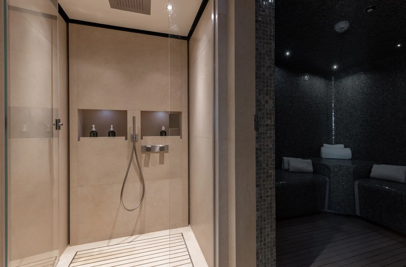 a bathroom with a shower aboard LEMON TREE Yacht for Charter