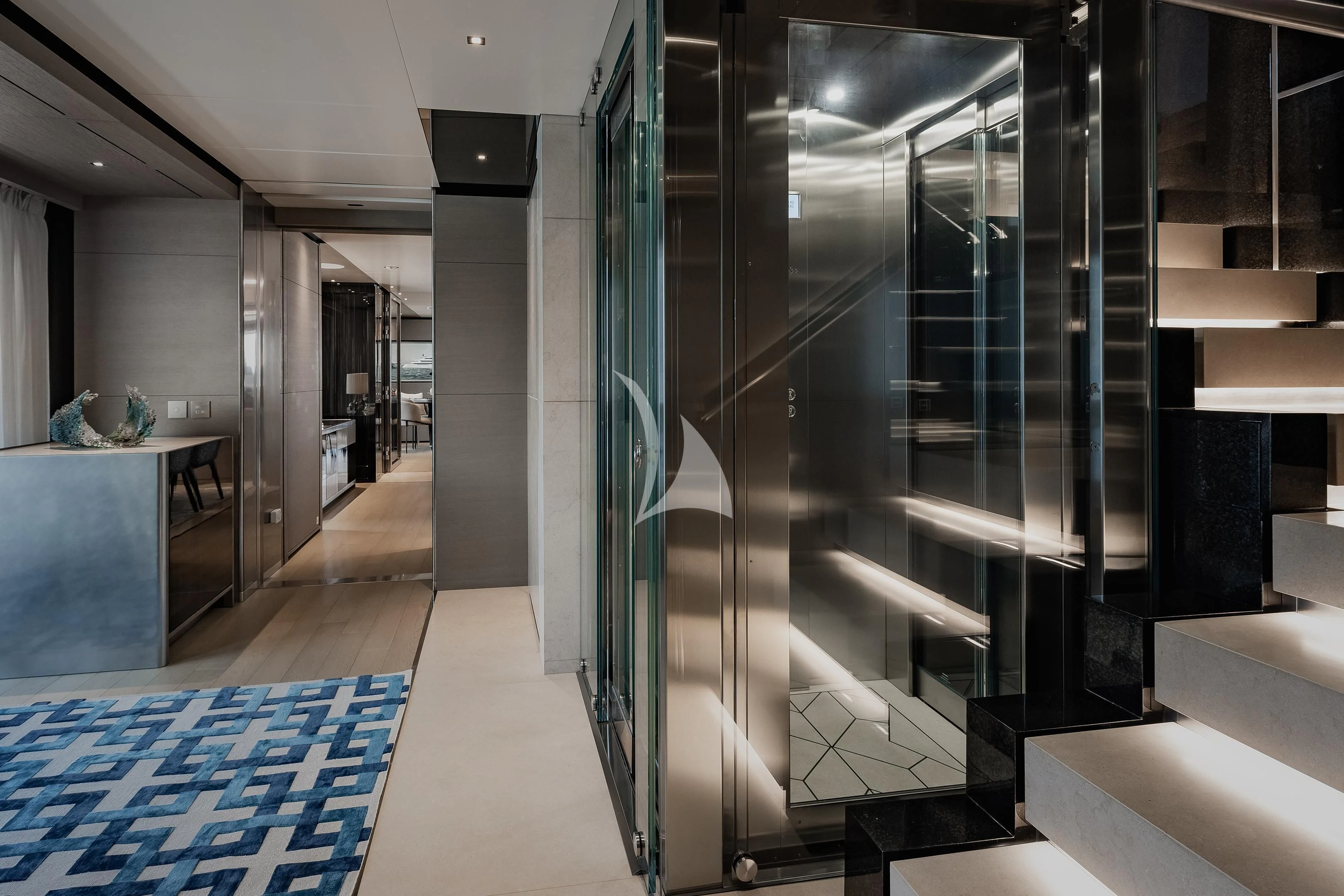 a room with glass walls and a glass wall aboard LEMON TREE Yacht for Charter