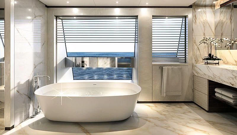 a large white bathtub in a bathroom aboard LEMON TREE Yacht for Charter