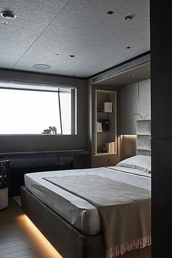 a room with a bed and a window aboard LEMON TREE Yacht for Charter