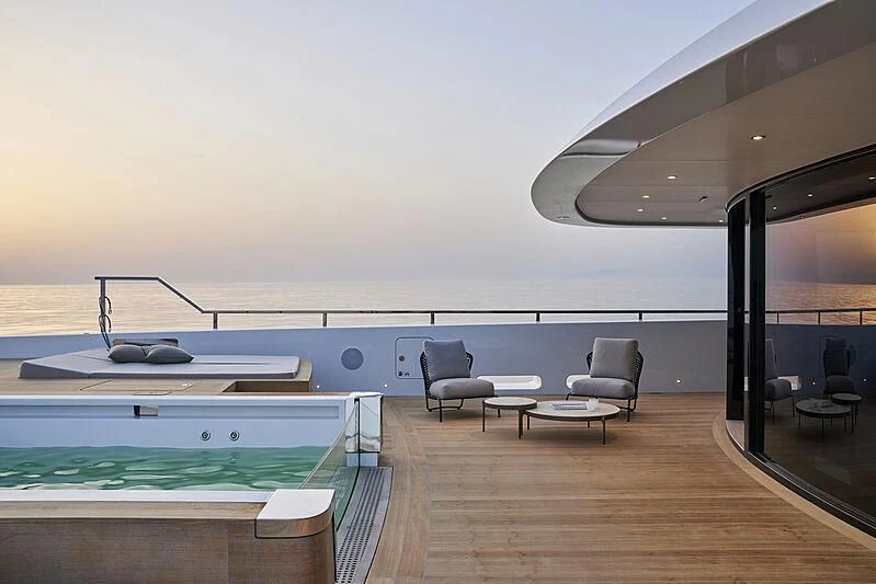 a room with a pool table and chairs aboard LEMON TREE Yacht for Charter