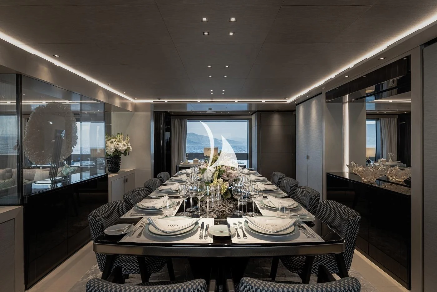a dining room with a table set aboard LEMON TREE Yacht for Charter