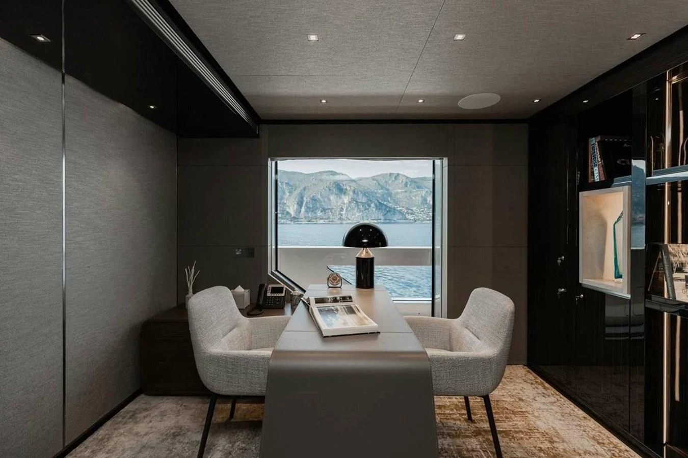 a room with a tv and a couch aboard LEMON TREE Yacht for Charter