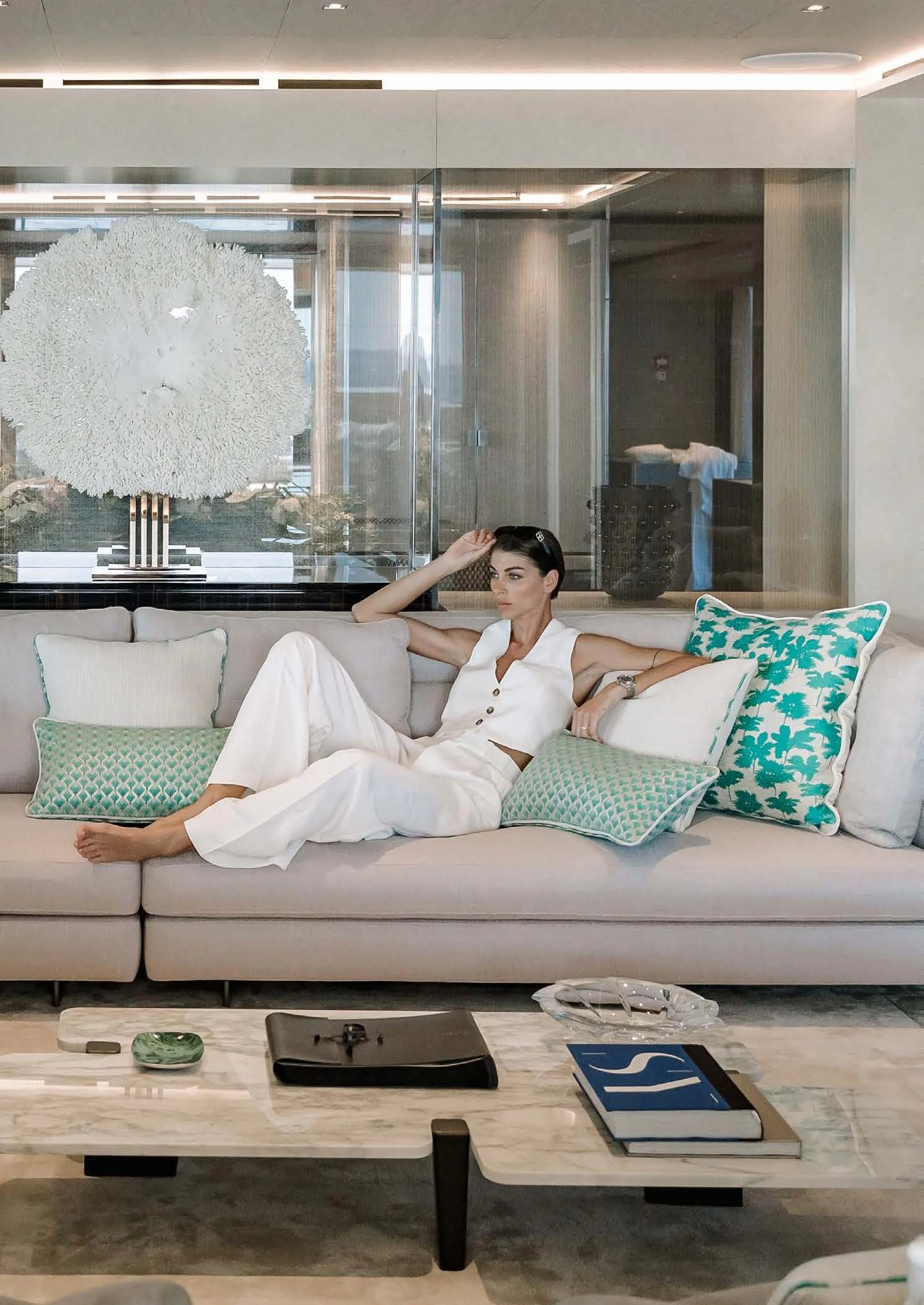 a person lying on a couch aboard LEMON TREE Yacht for Charter