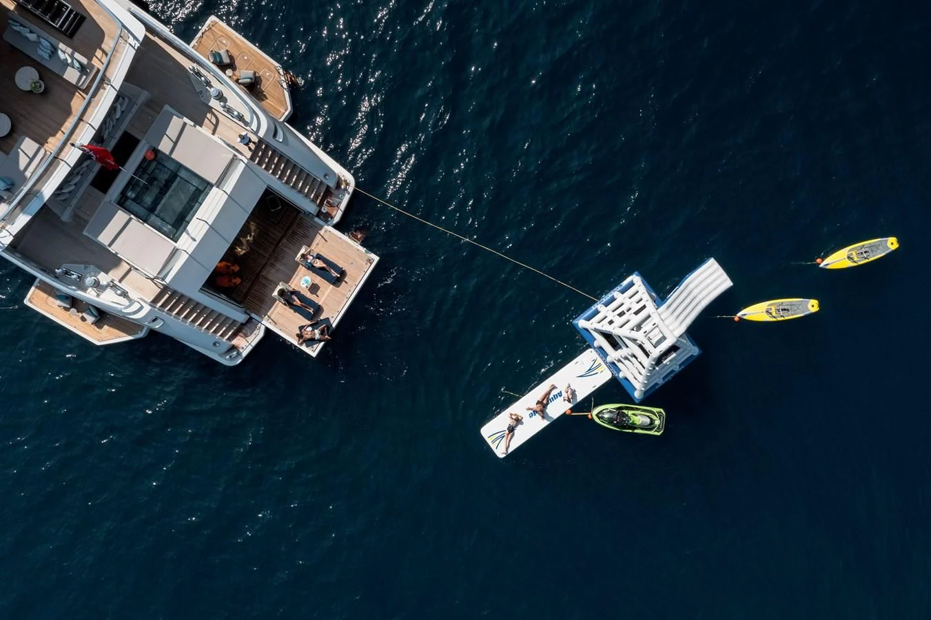 a group of boats on water aboard LEMON TREE Yacht for Charter