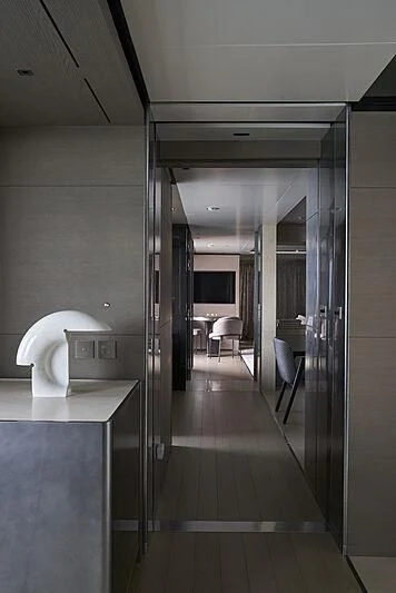 a room with a table and chairs aboard LEMON TREE Yacht for Charter