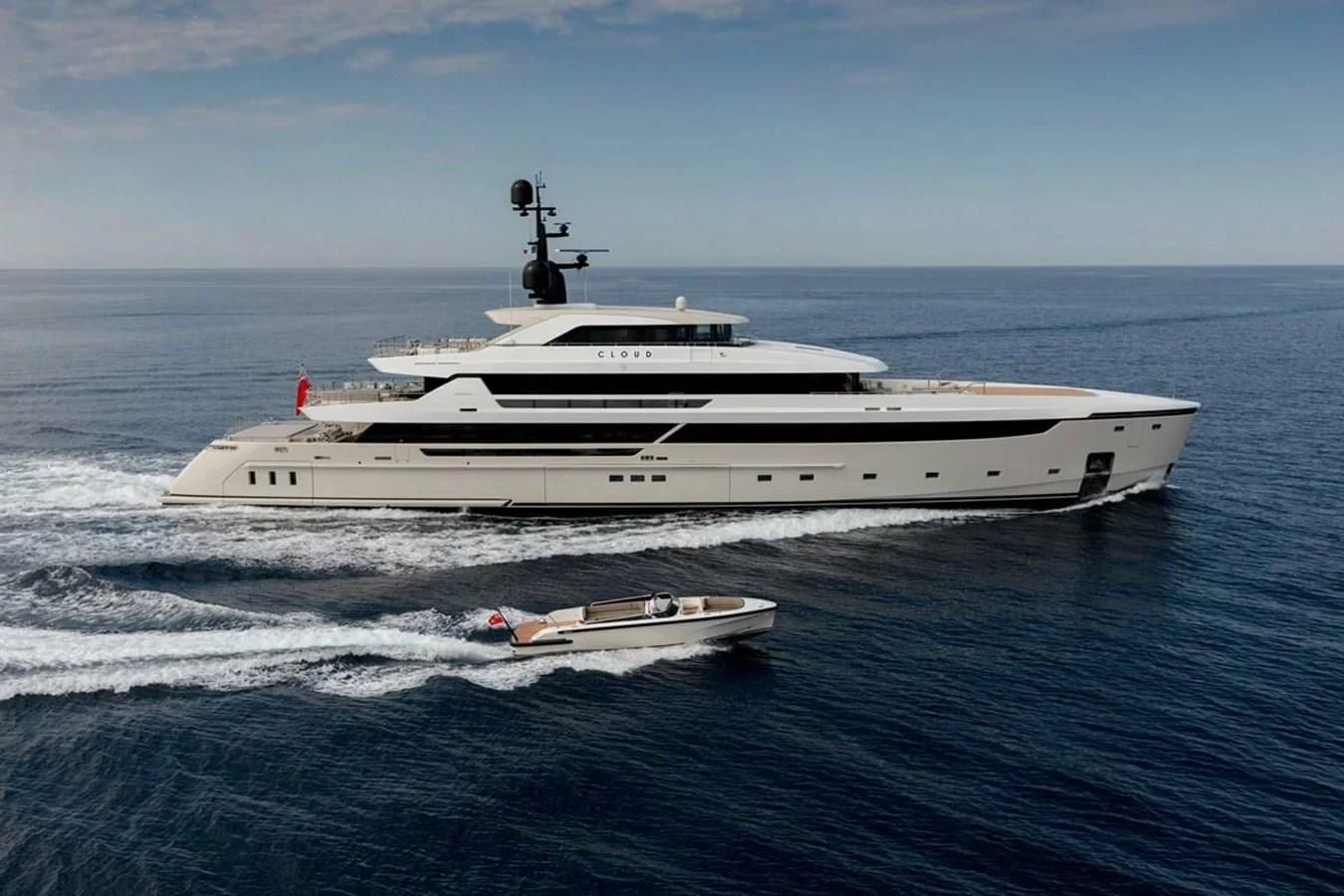 a large white ship in the water aboard LEMON TREE Yacht for Charter