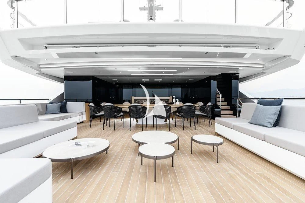 a room with a couch and a table and chairs aboard LEMON TREE Yacht for Charter