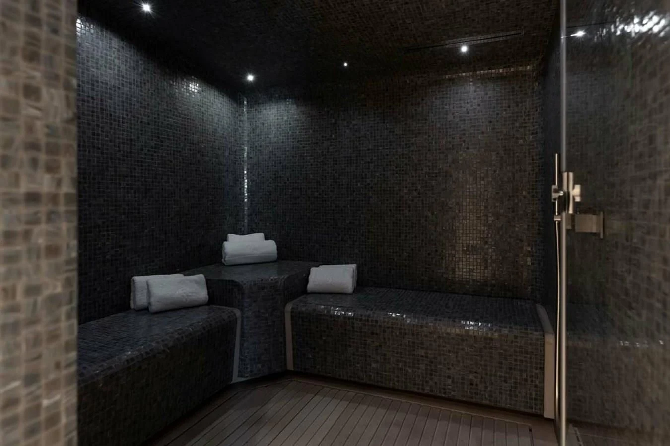 a bed in a room aboard LEMON TREE Yacht for Charter