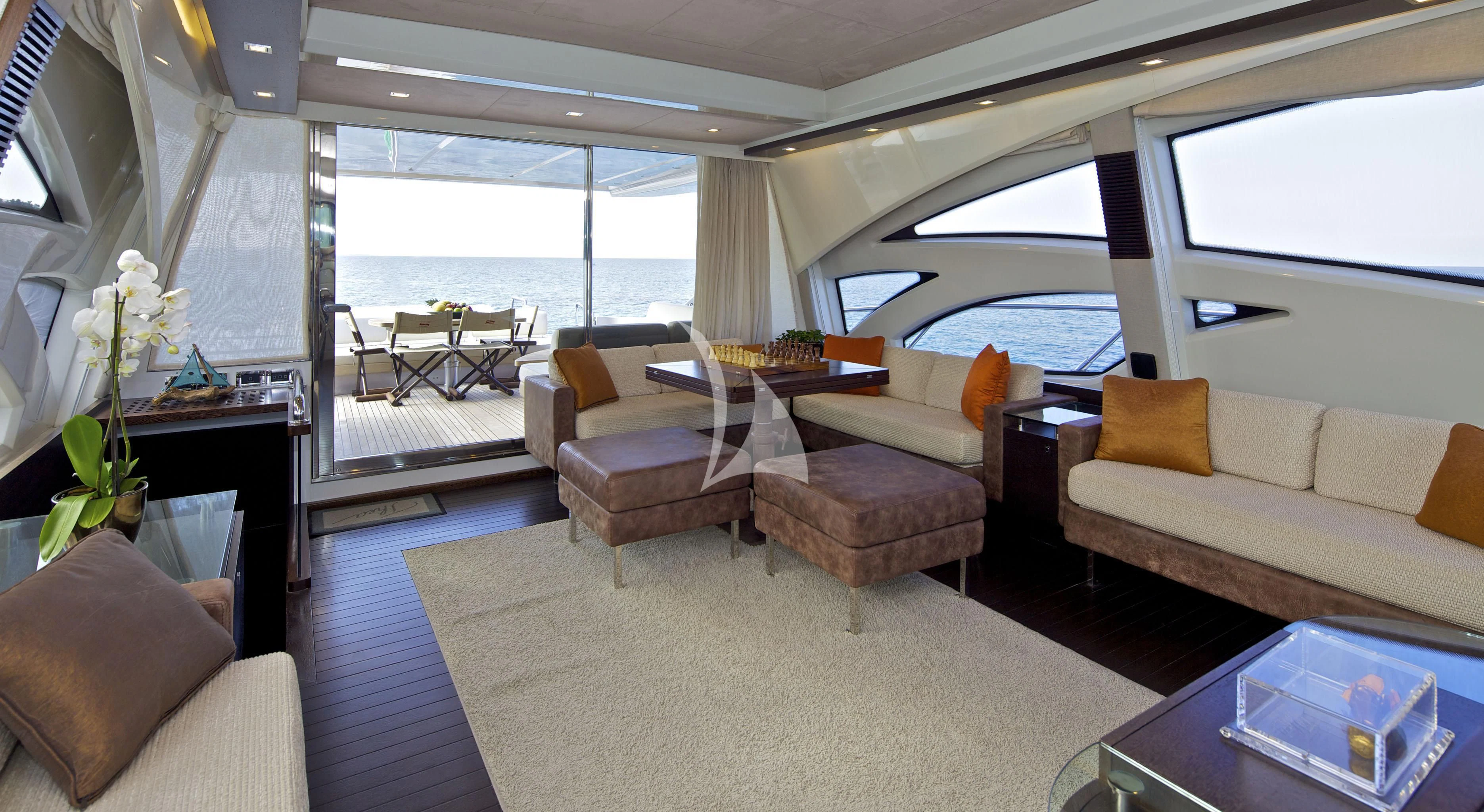 a living room with a large window aboard THEA MALTA Yacht for Sale