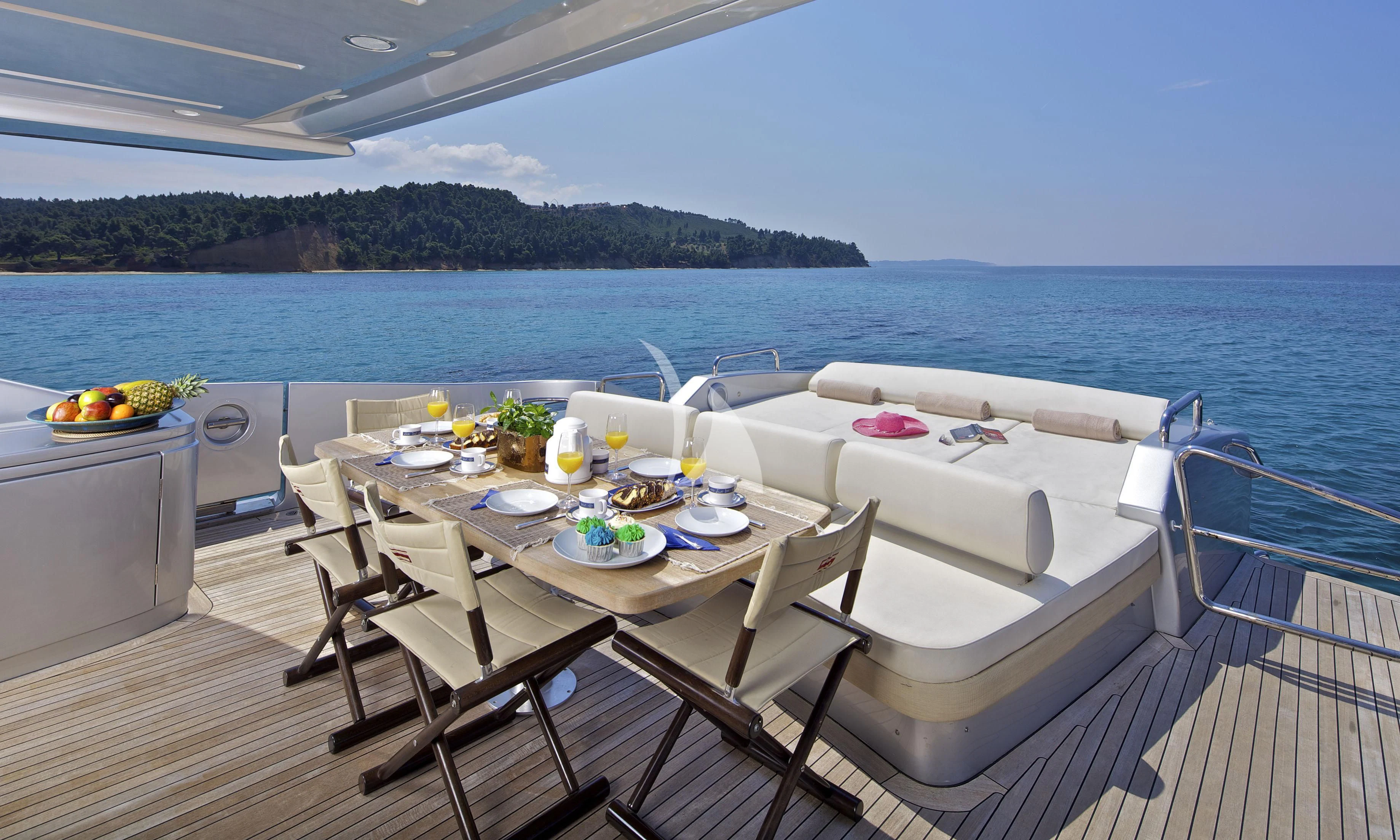 a table set for a meal on a boat aboard THEA MALTA Yacht for Sale