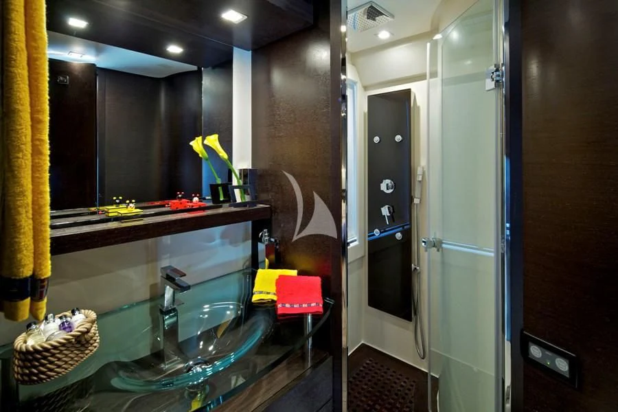 a room with a table and chairs aboard THEA MALTA Yacht for Sale