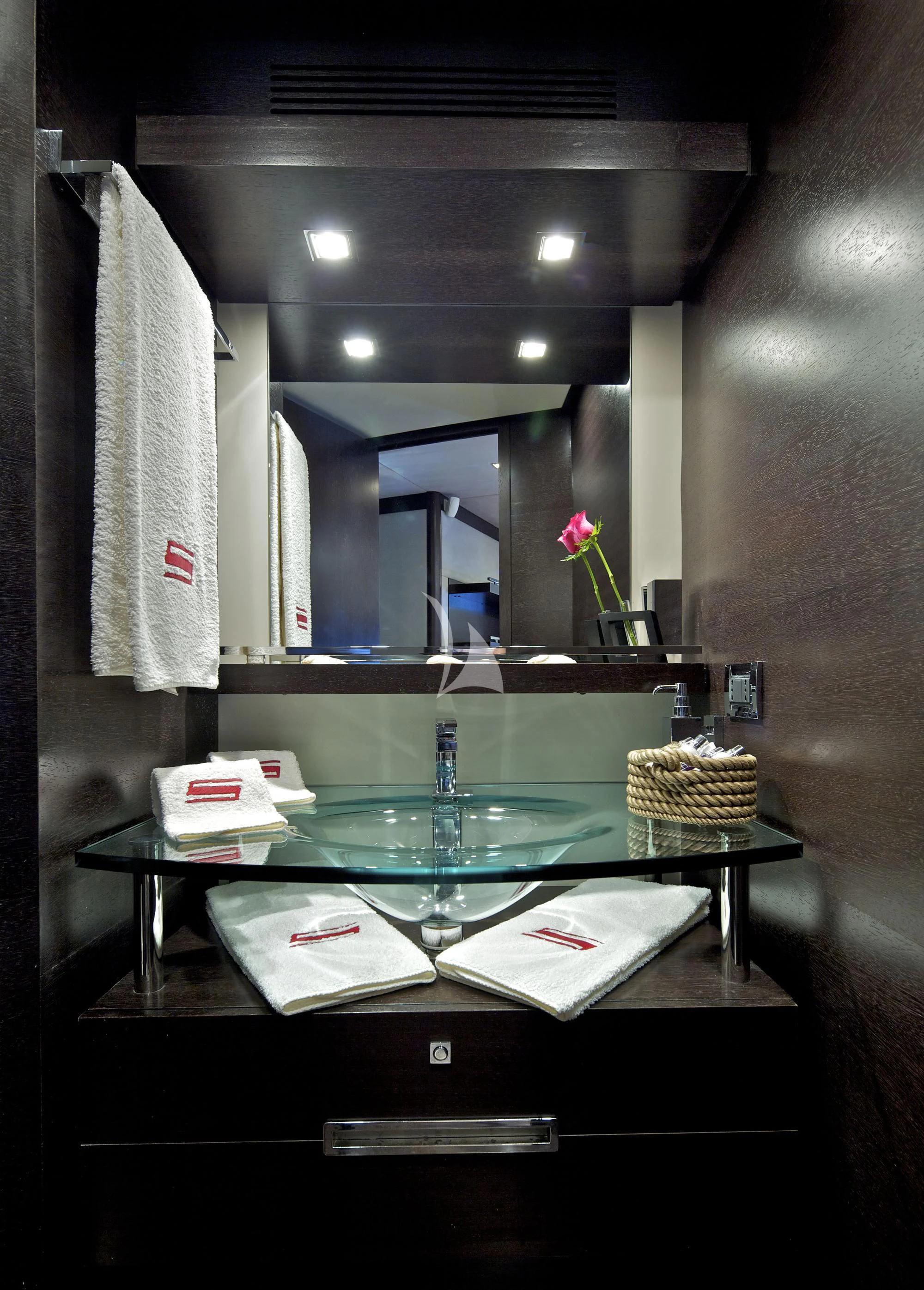 a counter with a sink and a mirror aboard THEA MALTA Yacht for Sale