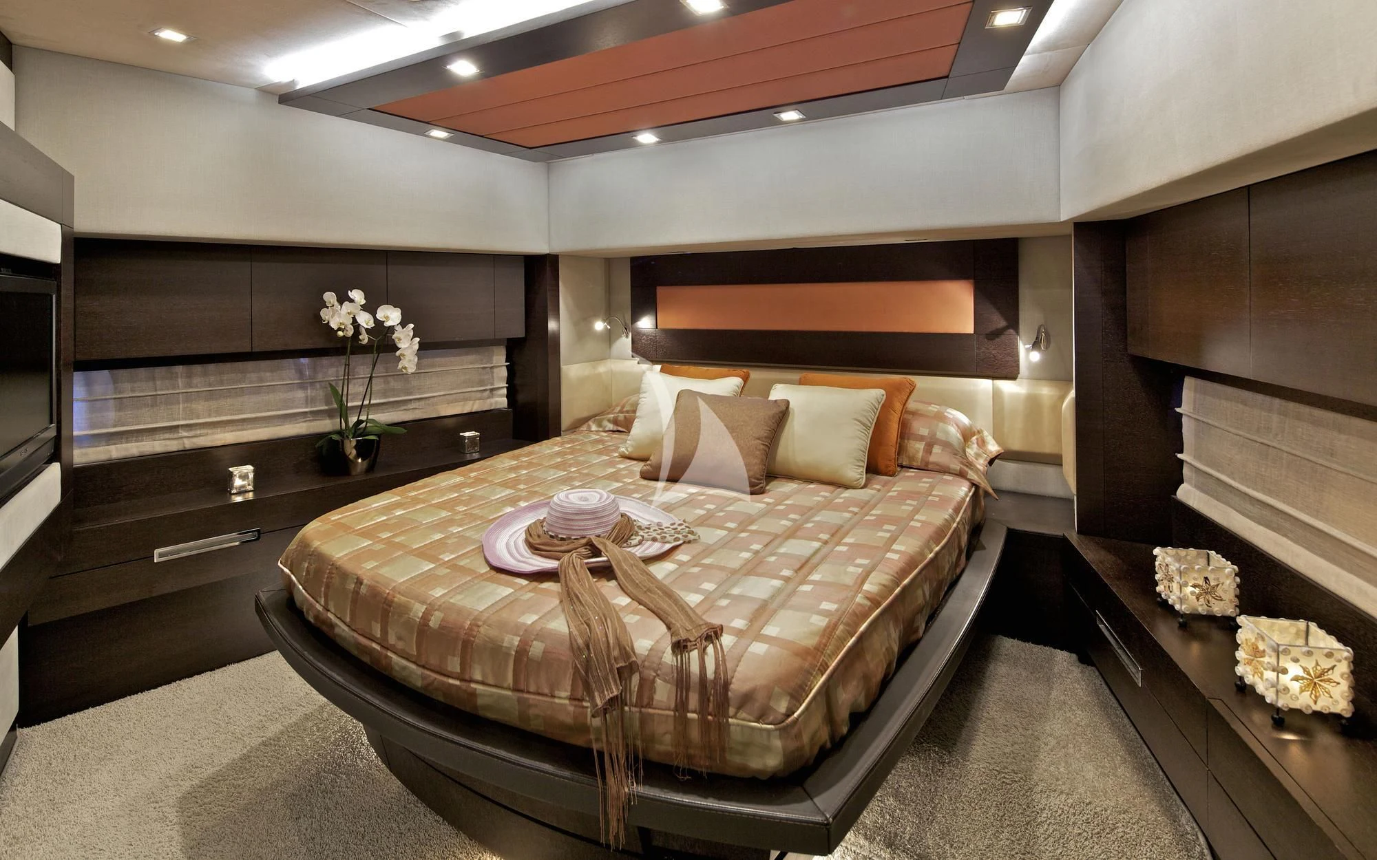 a modern bedroom with a large bed aboard THEA MALTA Yacht for Sale