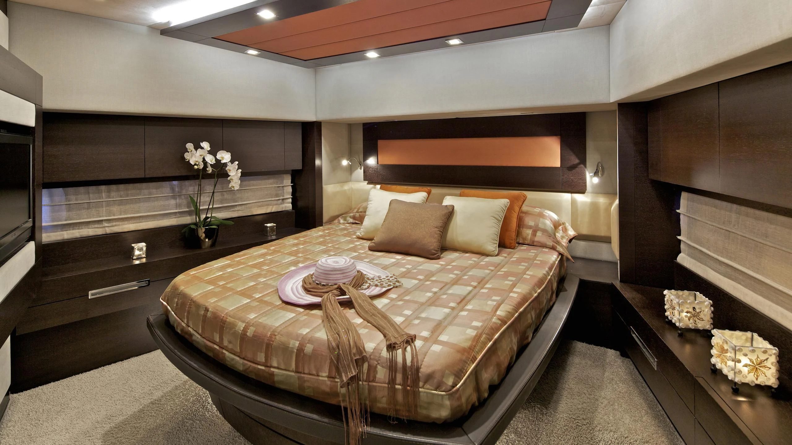 a large bed in a room aboard THEA MALTA Yacht for Sale