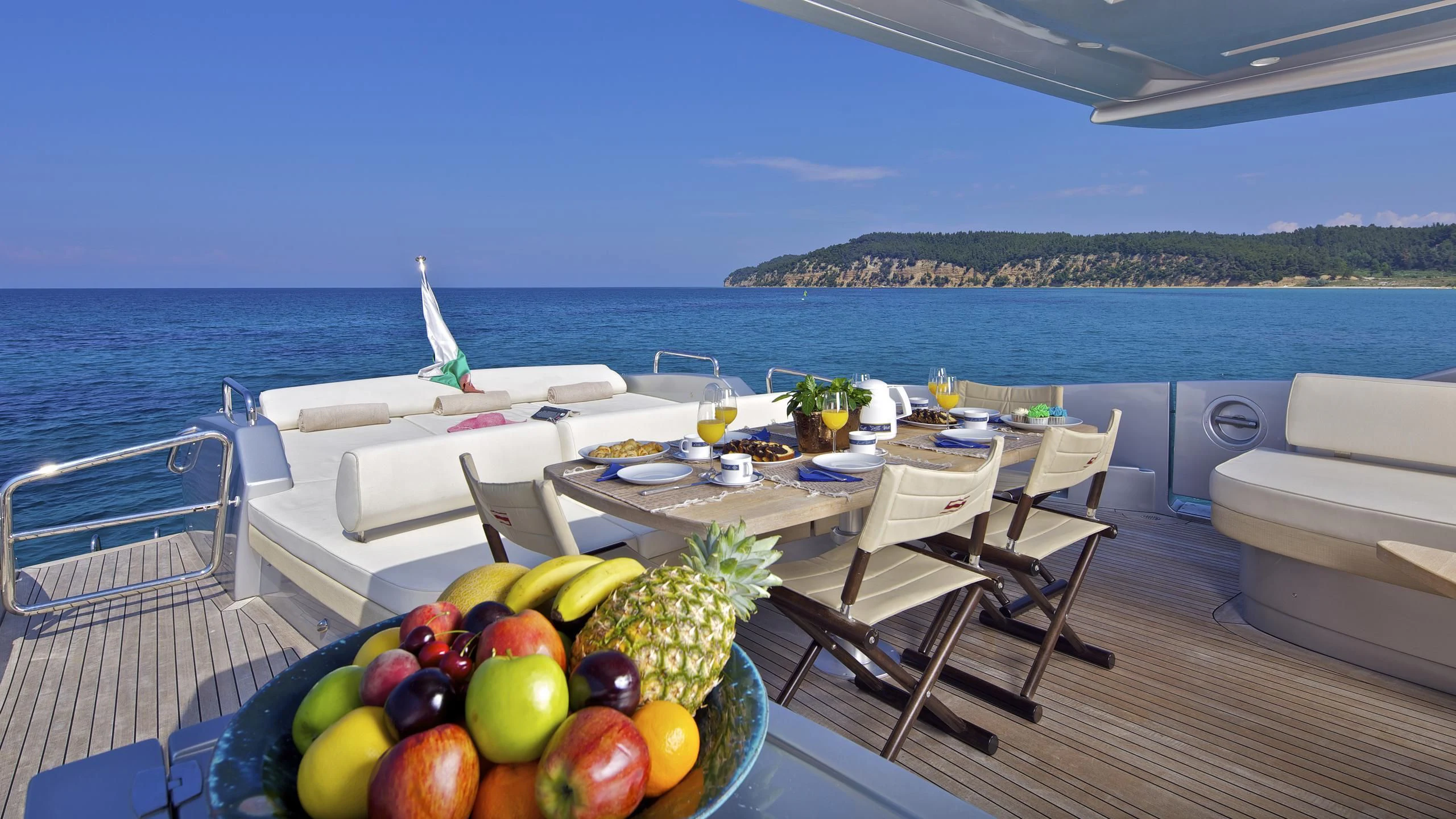 a table with fruits on it aboard THEA MALTA Yacht for Sale