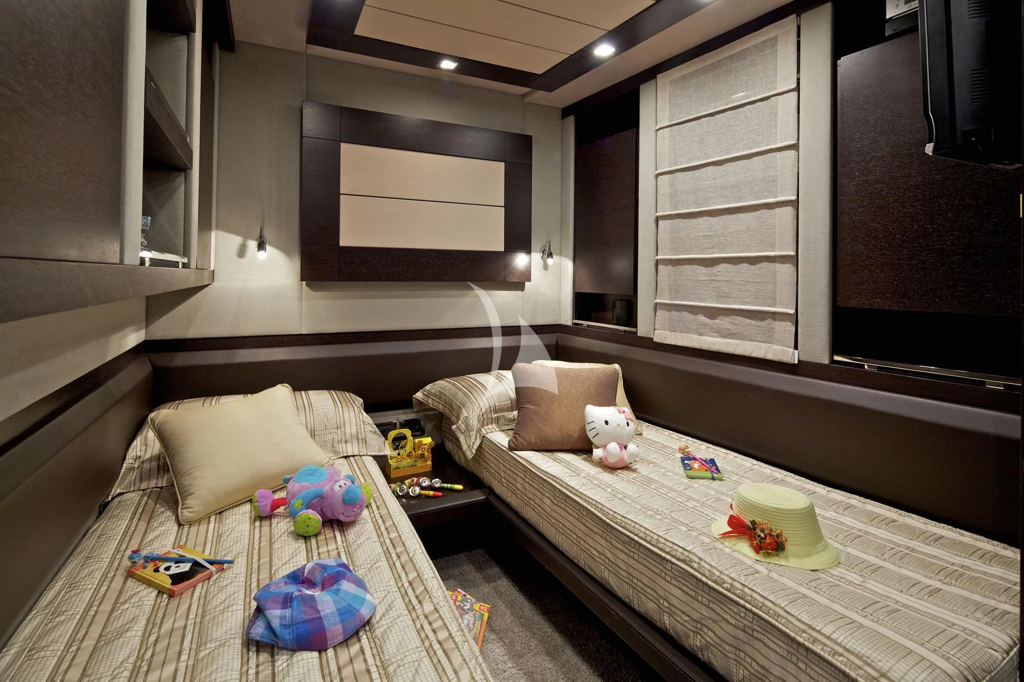 a bed with a blanket and pillows aboard THEA MALTA Yacht for Sale