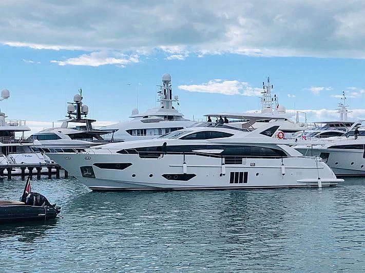 a large white yacht in the water aboard KALA Yacht for Sale