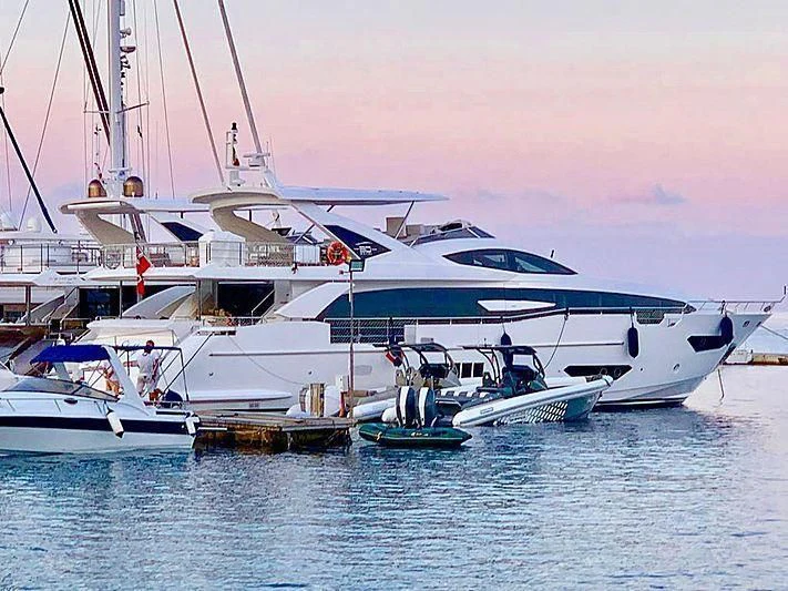 a group of boats on the water aboard KALA Yacht for Sale
