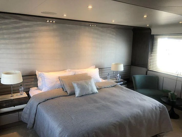 a bed in a room aboard KALA Yacht for Sale