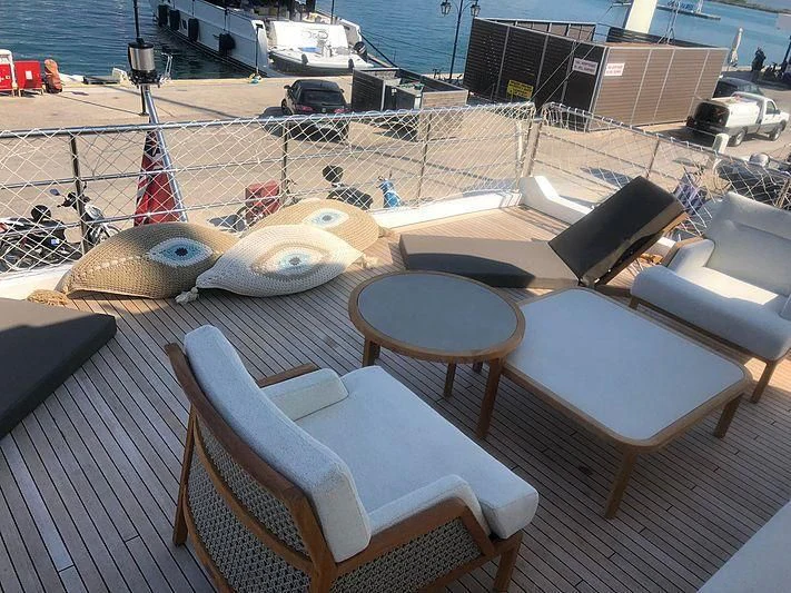 a boat on a deck aboard KALA Yacht for Sale