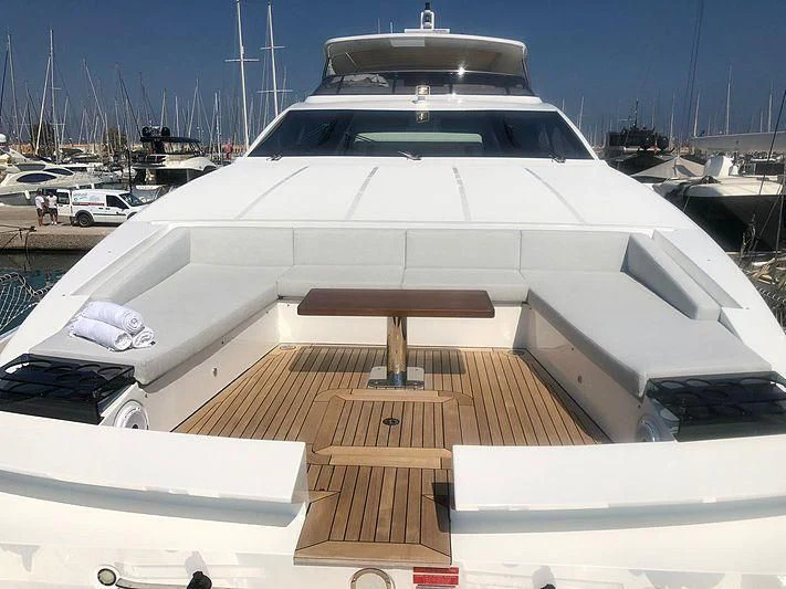 a yacht parked in a harbor aboard KALA Yacht for Sale