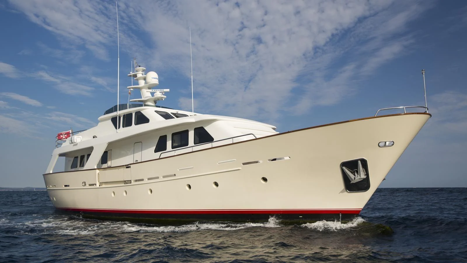 a large white boat in the water aboard M.C. Yacht for Sale