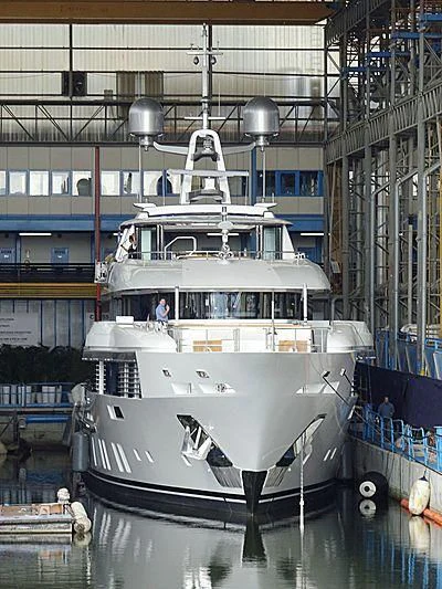 a large white boat in a large warehouse aboard E.MOTION+ Yacht for Sale