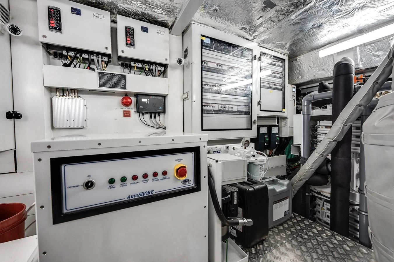 a room with white machines aboard TRIGGER HAPPY Yacht for Sale